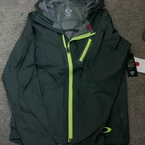 Dark green and neon wind breaker